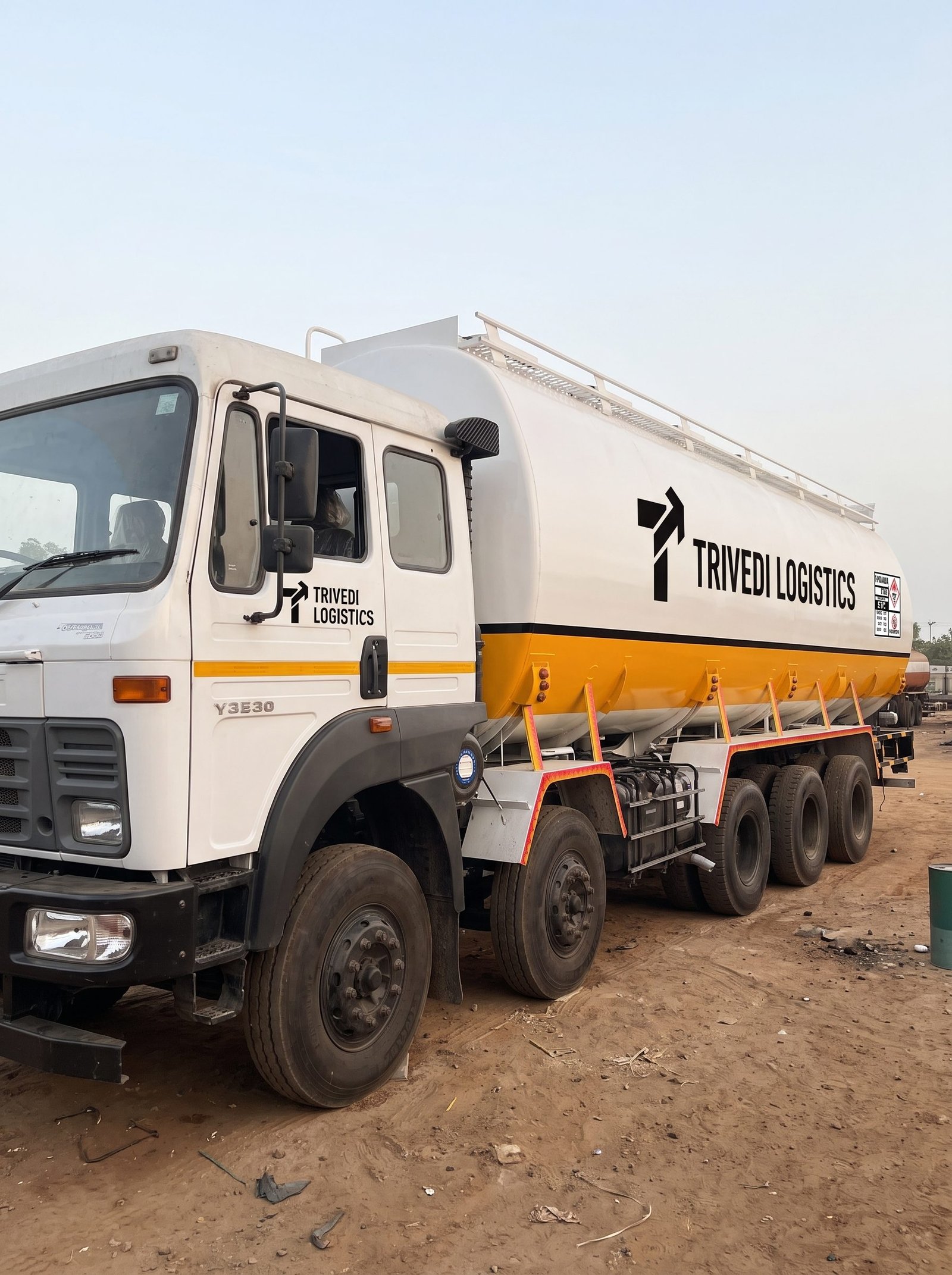 Trivedi Logistics tanker, front three-quarter view at the depot